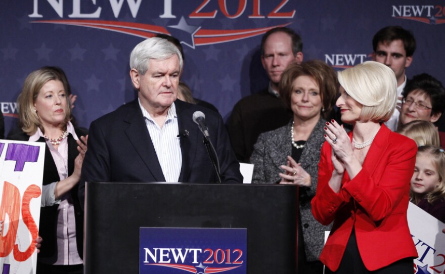 Former House Speaker Newt Gingrich appeared with wife Callista (right) at his Iowa caucus night rally in Des Moines.