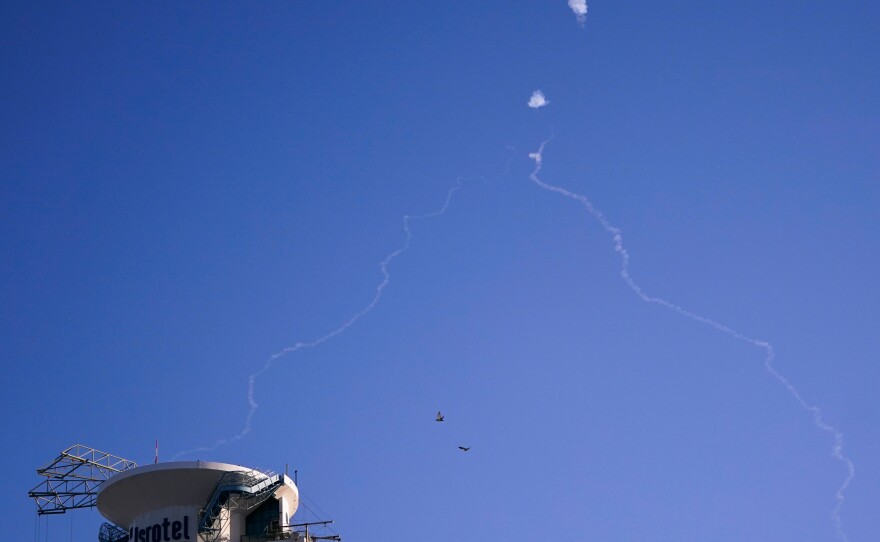 Israel's Iron Dome anti-missile system fires to intercept as air raid sirens sound in Tel Aviv, on Oct. 23, 2024.
