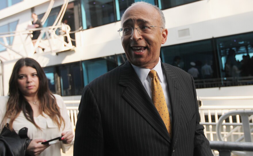 Mayoral candidate Bill Thompson departs a political forum on a boat in Manhattan on April 9.