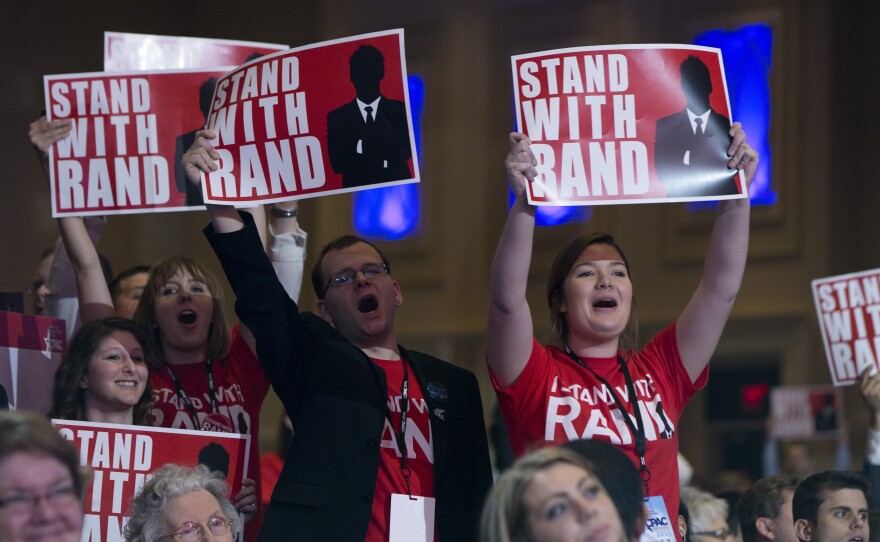 Supporters of Sen. Rand Paul's cheer as he speaks during CPAC.