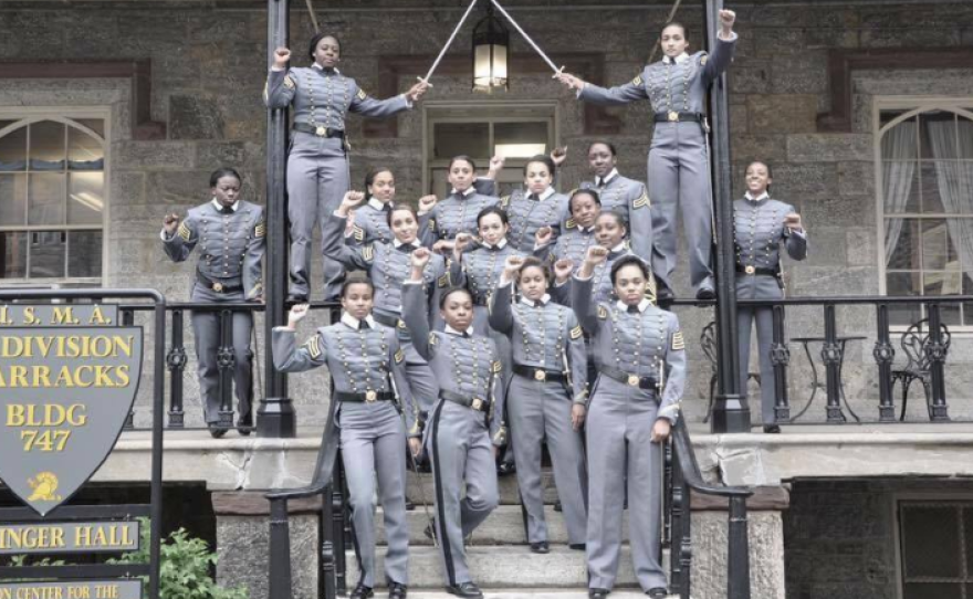 West Point cadets pose for a pre-graduation photo. The fist-raising is the center of an investigation by the military academy. Among the commentators on the incident is veteran John Burk, who posted this photo on his website.