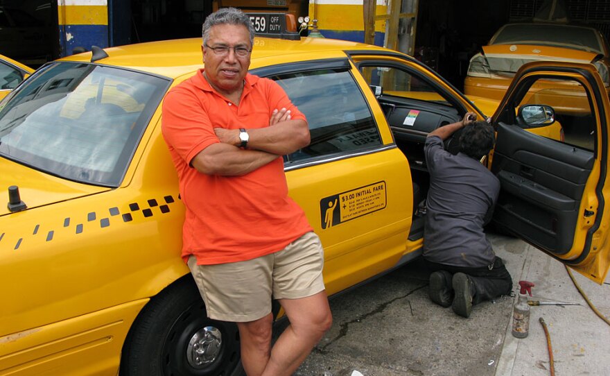 Jose Guevara, a cab driver for 30 years, leans on his trusty Crown Victoria. Ford is discontinuing the popular fleet vehicle in 2011, leaving the New York City Taxi and Limousine Commission in search of a replacement.