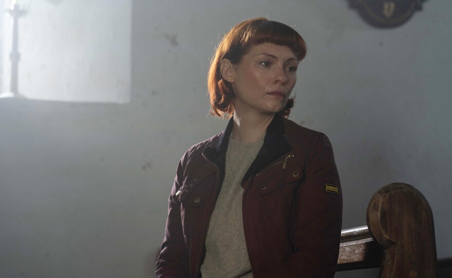MASTERPIECE: UNFORGOTTEN, Season 6, Episode 5. Lies are uncovered as Mel and Asif are taken into police custody. Juliet tries to protect Taylor, and herself, from the investigation. Shown: Melinda Ricci (MyAnna Buring)