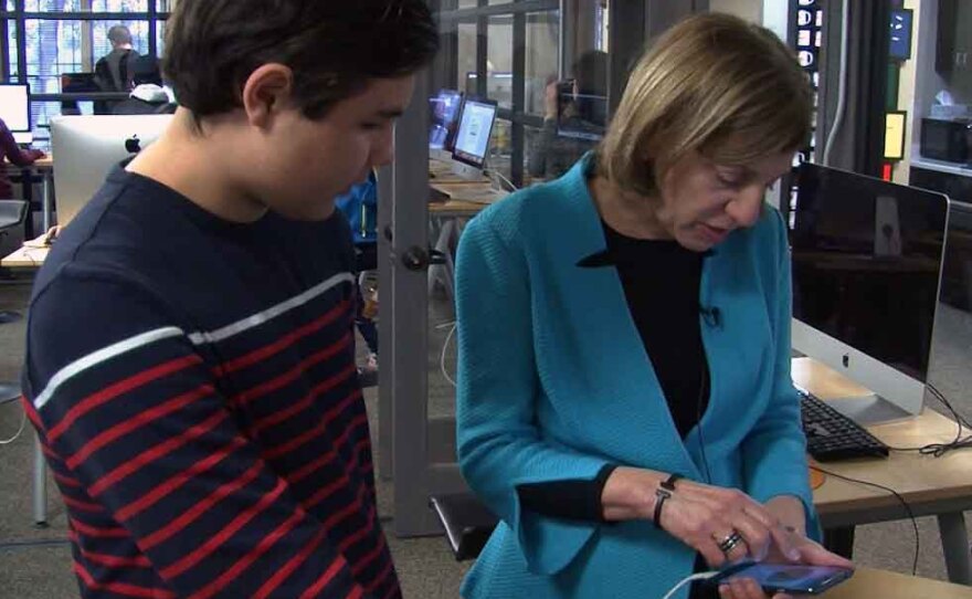 Ninth grader Matthew Smith shows City Councilwoman Barbara Bry a crime app he made in coding class, Jan. 22, 2017.