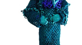 Artist Zac Monday in his crocheted, alien-like costume. He'll roam the SDMA galleries in his costume during the Summer Salon event tonight. 