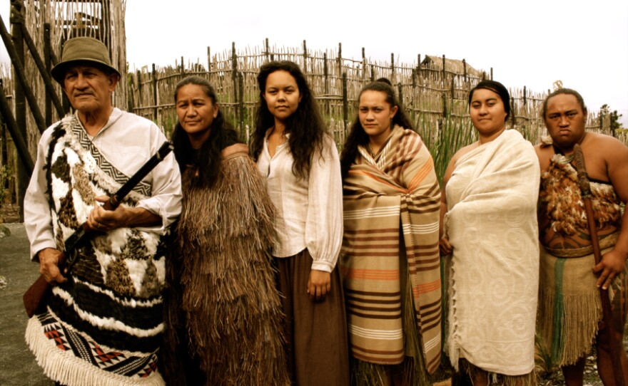 Family or "whanau" in a historic re-creation of Maori justice.