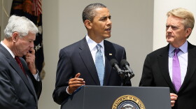 President Barack Obama makes a statement to the media while flanked by Co-Chairs of BP Oil Spill Commission, Bob Graham (L) and William Reilly (R), at the Rose Garden of the White House June 1, 2010 in Washington, DC.
