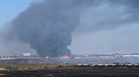 A brush fire burns in Otay Mesa, August 1, 2019. 