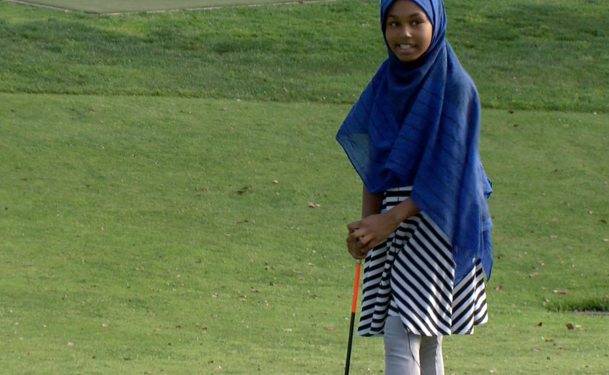 Nasteho Ali learns to play golf at Pro Kids in City Heights, May 10, 2016.