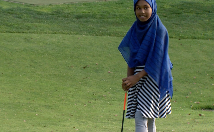 Nasteho Ali learns to play golf at Pro Kids in City Heights, May 10, 2016. 