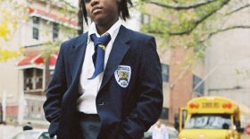 This film chronicles the struggles and triumphs of the first year of the Bronx Center for Science & Mathematics, an innovative public high school in New York City’s South Bronx. Pictured: Sharifea strikes a defiant pose standing outside of school.