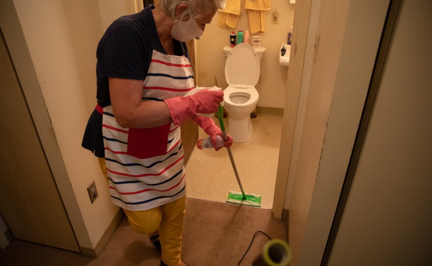 Kathleen McAuliffe, a part-time home care worker for Catholic Charities outside Portland, Maine, visits two clients a day. She helps with their housekeeping, preparing meals and getting them to doctors' appointments.