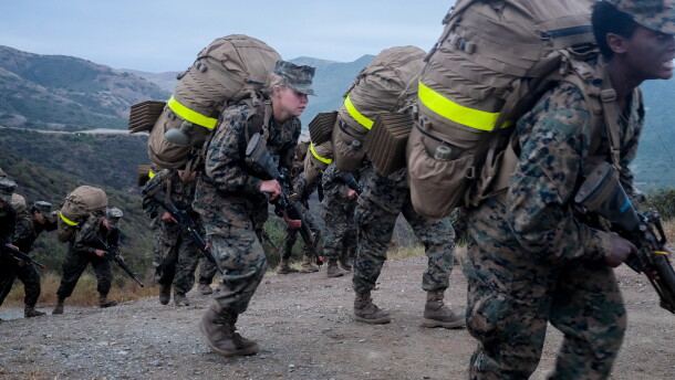 Marine recruits summiting the Reaper, the highest point in Camp Pendleton, and the last obstacle in their three-day, 54-hour Crucible, their last test before becoming Marines, April 22, 2021.