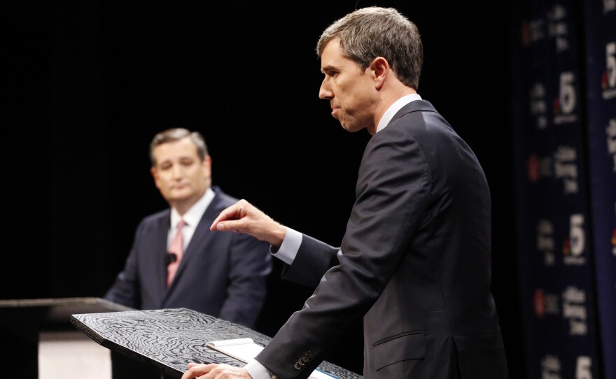 Democratic Rep. Beto O'Rourke makes a point as Republican Sen. Ted Cruz listens Friday during a debate at McFarlin Auditorium at Southern Methodist University in Dallas. O'Rourke is looking to unseat Cruz in November in what polls suggest has become a surprisingly close race.