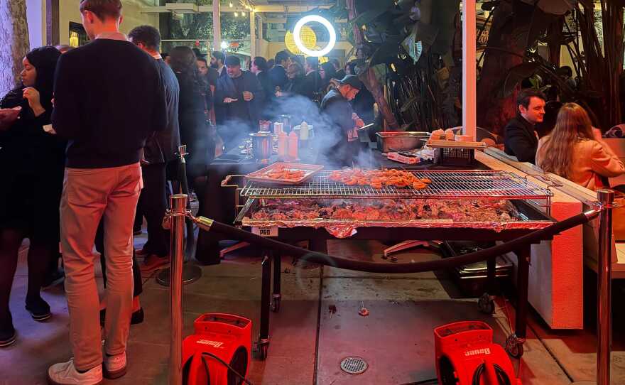 Food on a grill at the Back to Session Bash hosted by the California Tribal Business Alliance at Cafeteria 15L on 15th Street in Sacramento, on Jan. 15, 2026.