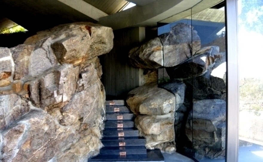 Built in 1968, Lautner's Elrod House is known for its domed concrete roof, skylights that provide indirect sunlight and the way the architect incorporated exposed rocks from the original hillside into the design.