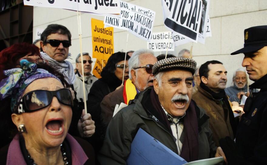 Garzon supporters gather during a demonstration outside the Supreme Court in Madrid, Jan. 24.