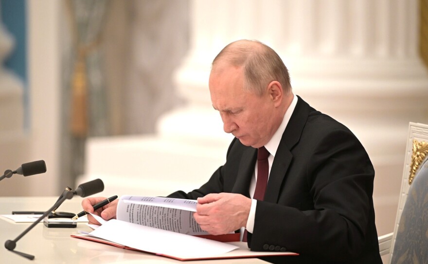 President of Russia, Vladimir Putin signs decrees on the recognition of the self-proclaimed Donetsk People's Republic (DPR) and the Luhansk People's Republic (LPR) in Moscow, Russia on February 21, 2022.