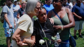 Mourners gather at a vigil in Dayton, OH, following a nearby mass shooting Aug. 4, 2019. 