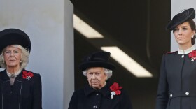 Britain's Queen Elizabeth II, center, Camilla, Duchess of Cornwall, and Kate, Duchess of Cambridge, right, attend the Remembrance Sunday ceremony at the Cenotaph in London, Sunday, Nov. 11, 2018. Remembrance Sunday is held each year to commemorate the service men and women who fought in past military conflicts. 2018 marks the centenary of the armistice and cessation of hostilities in WWI, which ended on the eleventh hour of the eleventh day of the eleventh month,1918. (AP Photo/Alastair Grant)
