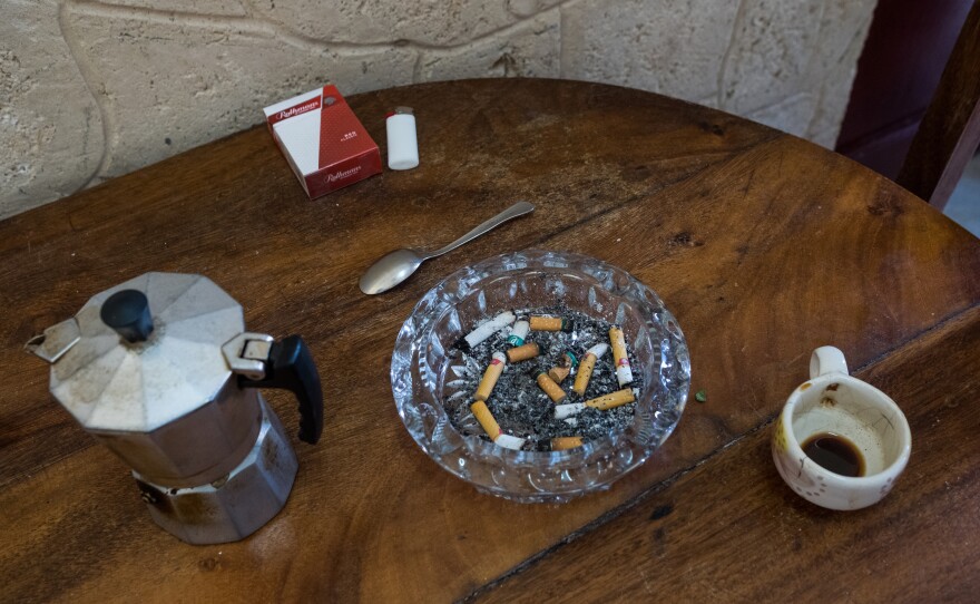 Leftover coffee and cigars smoked by Lauren at her home in Havana. The couple had quit smoking before Jan left Cuba. During Jan's journey, Lauren suffered from many anxiety attacks and returned to smoking.