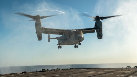A U.S. Marine Corps MV-22B Osprey attached to Marine Medium Tiltrotor Squadron (VMM) 165, lands aboard the amphibious dock landing ship USS Harpers Ferry in the Pacific Ocean, Nov. 19, 2023.