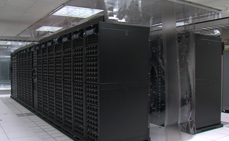 Server rows fill the San Diego Supercomputer Center, Oct. 14, 2015. 