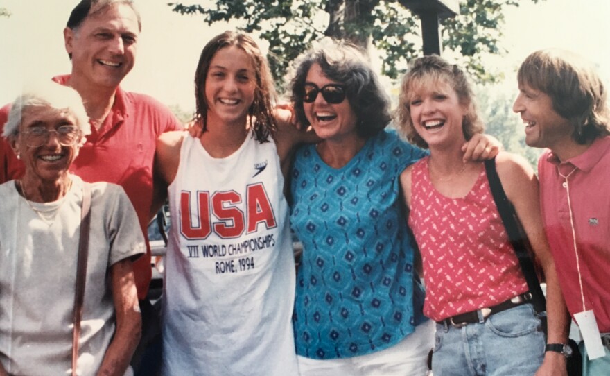 Swimmer Cristina Teuscher Fabbri (third from left) with her family and coach John Collins (right) at the 1994 World Championships in Rome.