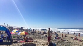 Hundreds of people are at Mission Beach this hot Presidents Day holiday, Feb. 15, 2015.