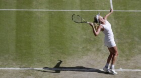 Coco Vandeweghe of the United States serves to Maria Sharapova of Russia during their singles match at the All England Lawn Tennis Championships in Wimbledon, London, July 7, 2015.