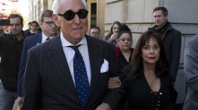 Roger Stone, left, with his wife Nydia Stone leave federal court in Washington, Friday, Nov. 15, 2019.