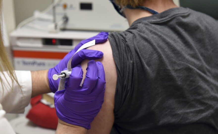 The first patient enrolled in Pfizer's COVID-19 vaccine clinical trial at the University of Maryland School of Medicine in Baltimore receives an injection in May.