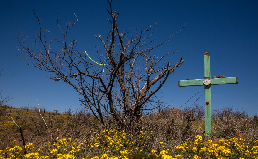 Ãlvaro Enciso places crosses at sites where migrants are known to have died in the borderland, this cross represents the death of Nolberto Torres-Zayas just east of Arivaca, Arizona on Wednesday, March 27, 2024. Torres-Zayas died of hyperthermia in 2009, not far from a Humane Borders water cache that had been vandalized and drained.
