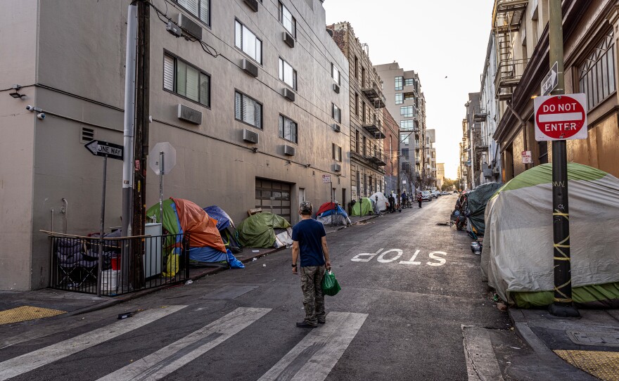 Homeless people living in tents line a side street in the Tenderloin district. More than 40% of all drug overdoses are in the Tenderloin and neighboring SOMA district, according to city data.