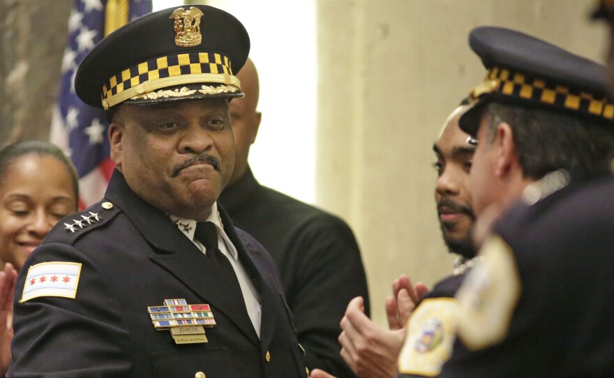 Chicago Police Superintendent Eddie Johnson (left) at a City Council meeting in 2016. Johnson says new hires and data-driven policing are helping to bring crime numbers down.