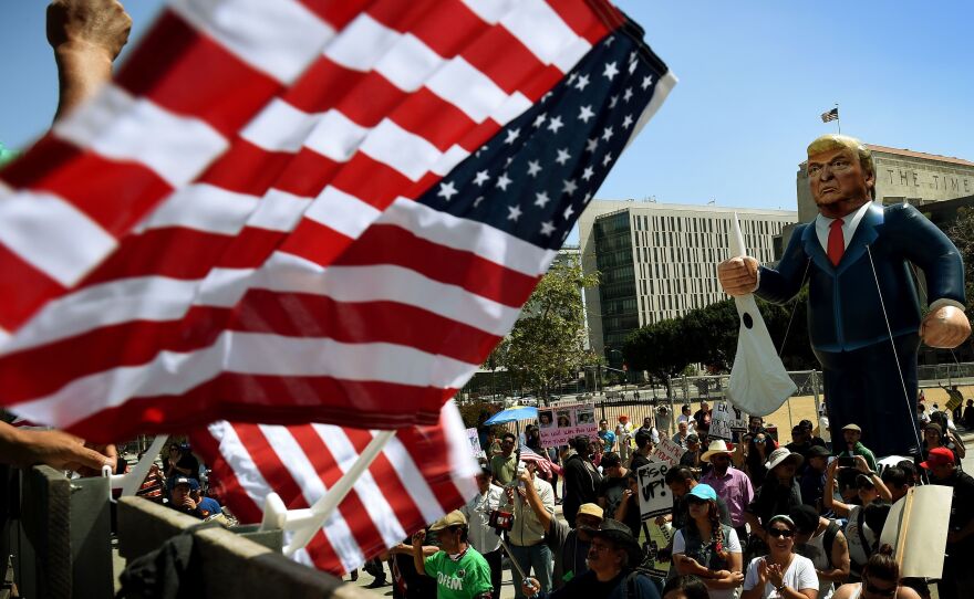 Members of the "Full Rights for Immigrants Coalition" displayed a giant effigy of then-candidate Donald Trump on May Day in Los Angeles last year.