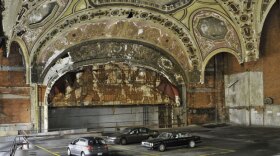 Correspondent Miles O’Brien says he’s saddened every time he returns to the Motor City and sees “the ruins of a once great city.” Pictured: Michigan Theatre, now a parking garage.