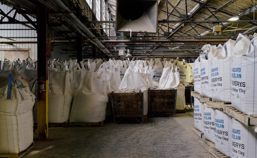 Bags of clay sit in storage. Though pottery has been made in the region for hundreds of years, local clay is too coarse to make products like Fiesta. The Ohio River proved instrumental in importing clay from places like Georgia after the Civil War.