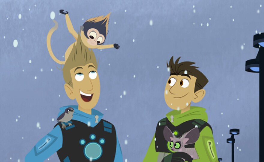 Chris and spider monkey spiking Martin's hair in "Wild Kratts Creature Christmas."