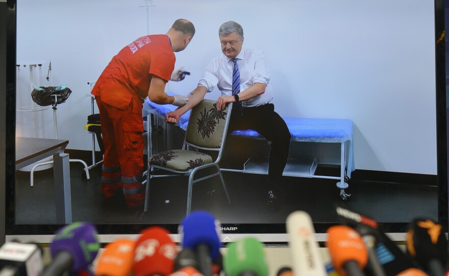 Ukrainian presidential candidate Petro Poroshenko takes a televised blood test.