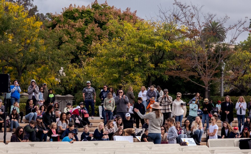 Sharon McKeeman, the founder of Let Them Breathe, speaks to parents who kept children home from school to protest COVID-19 vaccine mandates in schools. Balboa Park in San Diego, Calif. Oct 18, 2021.