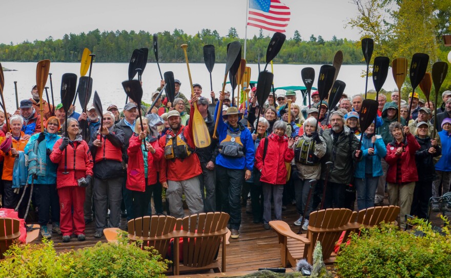 Amy and Dave Freeman's friends, family and supporters gather at River Point Resort and Outfitting Company in Ely, Minn., across from the proposed Twin Metals mine site, in preparation for the couple's launch on Sept. 23.