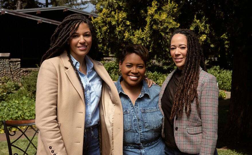 Cassandra (center) connects with her wine sisters Robin McBride and Andréa McBride while getting a first look at M Ranch in Napa.