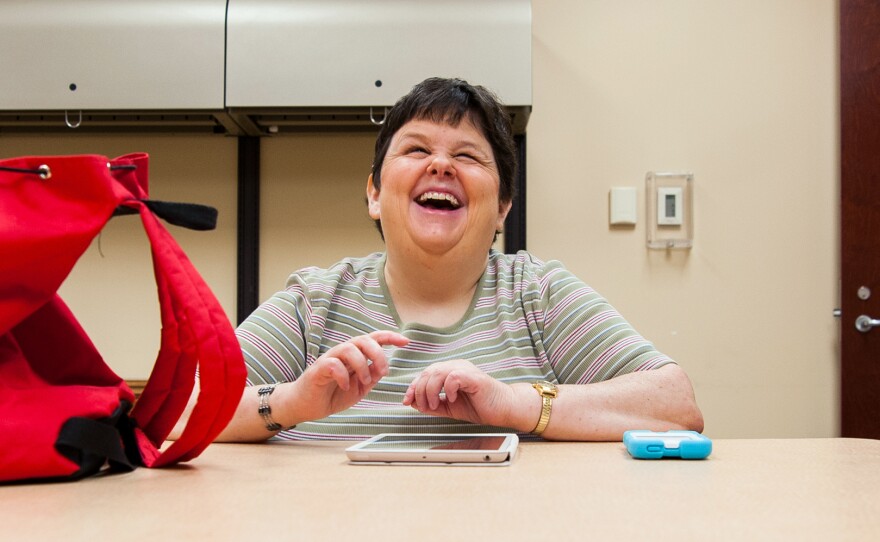 Debbie Eagle, a 43-year-old who has been blind since birth, says she can't find work, even though she has a bachelor's degree in special education. She volunteers at the Center for Individuals with Physical Challenges in Tulsa.