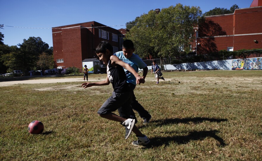 Recess means soccer on the sprawling field behind Watts. Also within the school fenceline is a walking track and a student garden.