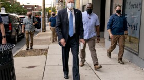 Democratic presidential candidate former Vice President Joe Biden stops to speak to members of the media as he walks out of the Queen Theater in Wilmington, Del., Thursday, Oct. 1, 2020. 