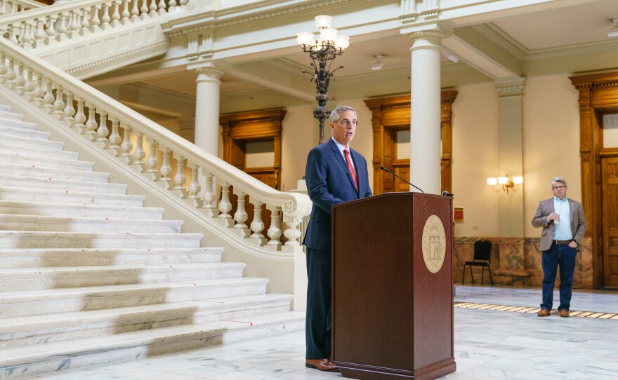 Georgia Secretary of State Brad Raffensperger, a Republican who's seen here on Oct. 25, is the ultimate decider of the state's presidential primary date. At right is Gabriel Sterling, chief operating officer in Raffensperger's office.