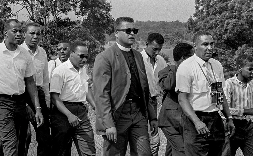 Southern Christian Leadership Conference members (SCLC), civil rights advocates, March Against Fear. L-R: unknown, Floyd McKissick, unknown (maybe Bernard Lee), Martin Luther King, Jr, James Lawson, Stokely Carmichael (Kwame Ture), Ernest C. Withers, Withers son (?). King joined to draw attention to the march started by James Meredith after Meredith was shot by a white segregationist, June 7, 1966