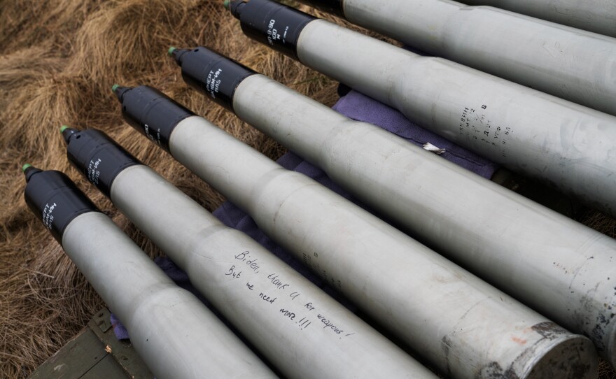 A message on a shell at the training area in western Ukraine reads: "Biden, thank you for the weapons, we need more."