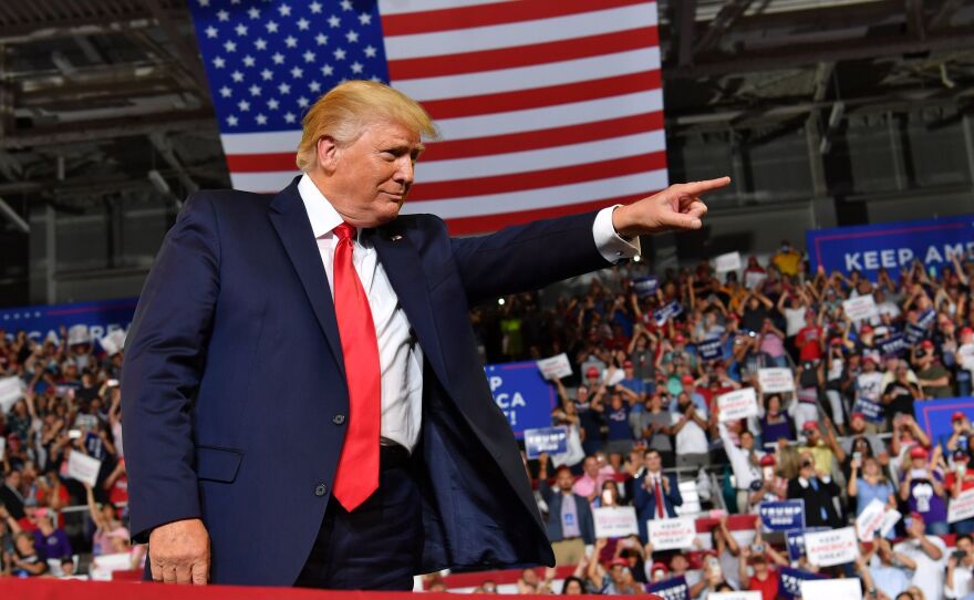President Trump continued his attacks on members of Congress during a campaign rally in Greenville, N.C., Wednesday night.